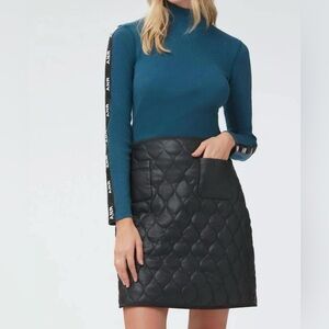 NWT Alp N Rock Kiko
Faux black leather quilted skirt. Fully lined. Beautiful!